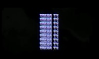 a black screen with a blue light on it